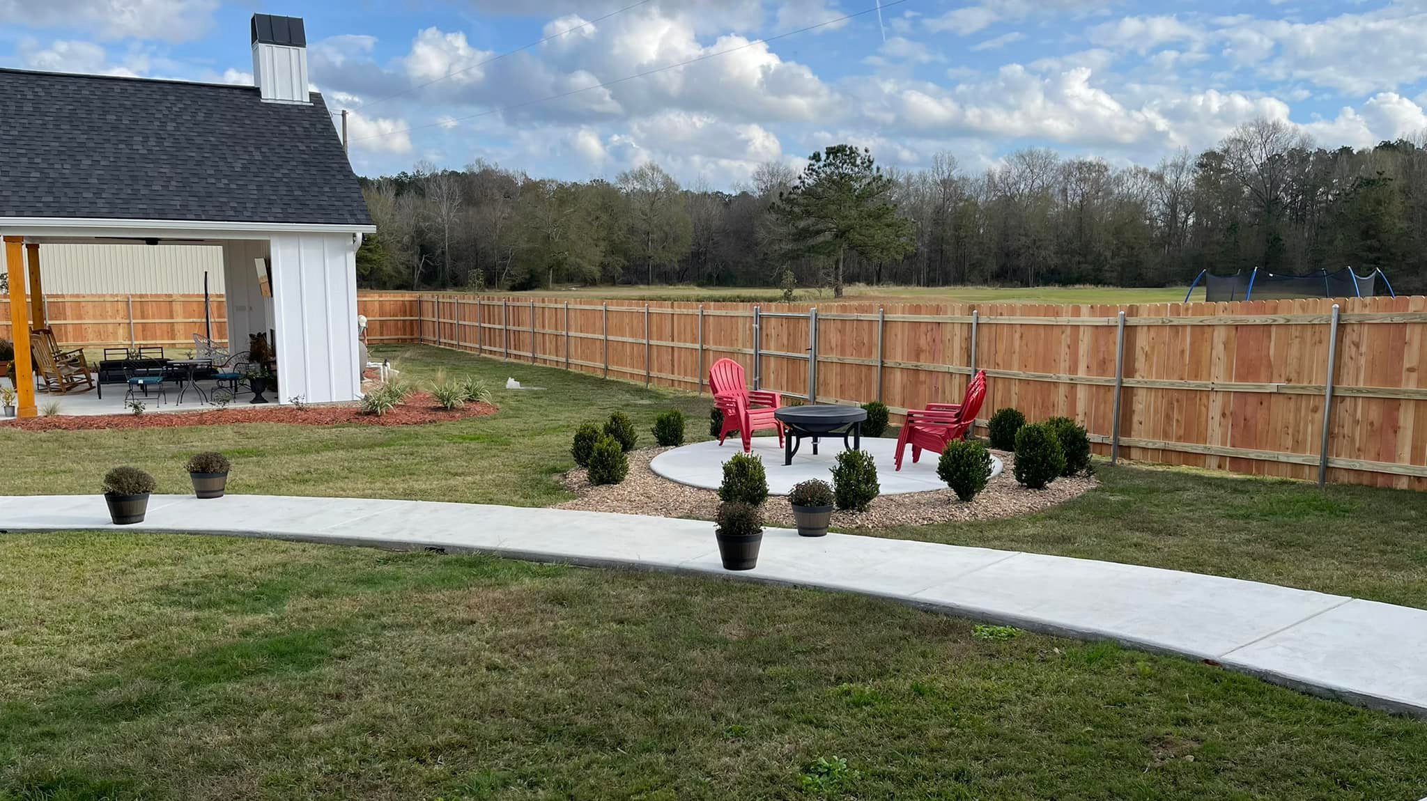 Backyard with cedar privacy fence and outdoor living